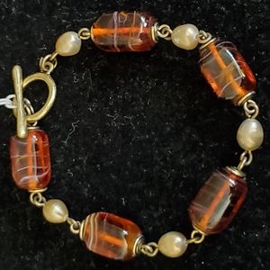 Lia Sophia goldtone toggle closure bracelet with brown beads